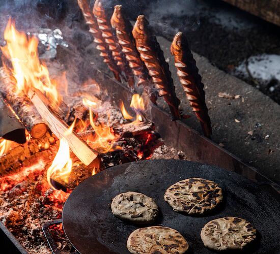 Baking in the Timber Smoke Hut © kukkolaforsen