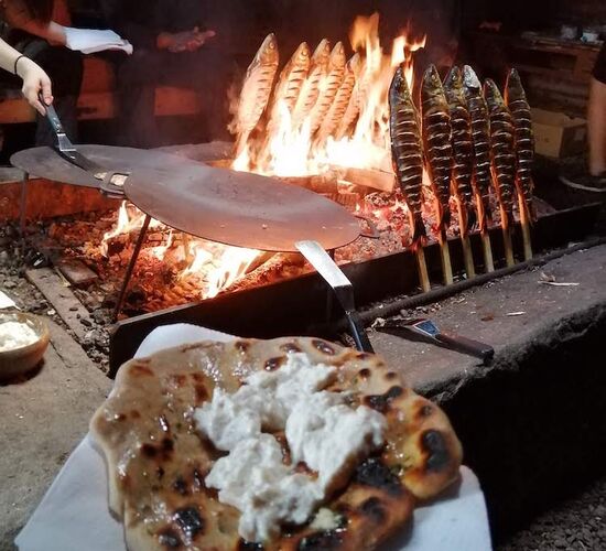 Baking in the Timber Smoke Hut © kukkolaforsen