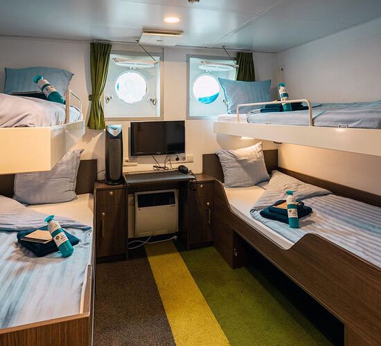 Four person cabin with portholes © ship ortelius